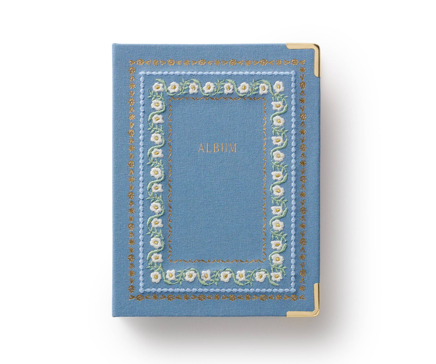 Blue album with floral design on a white background