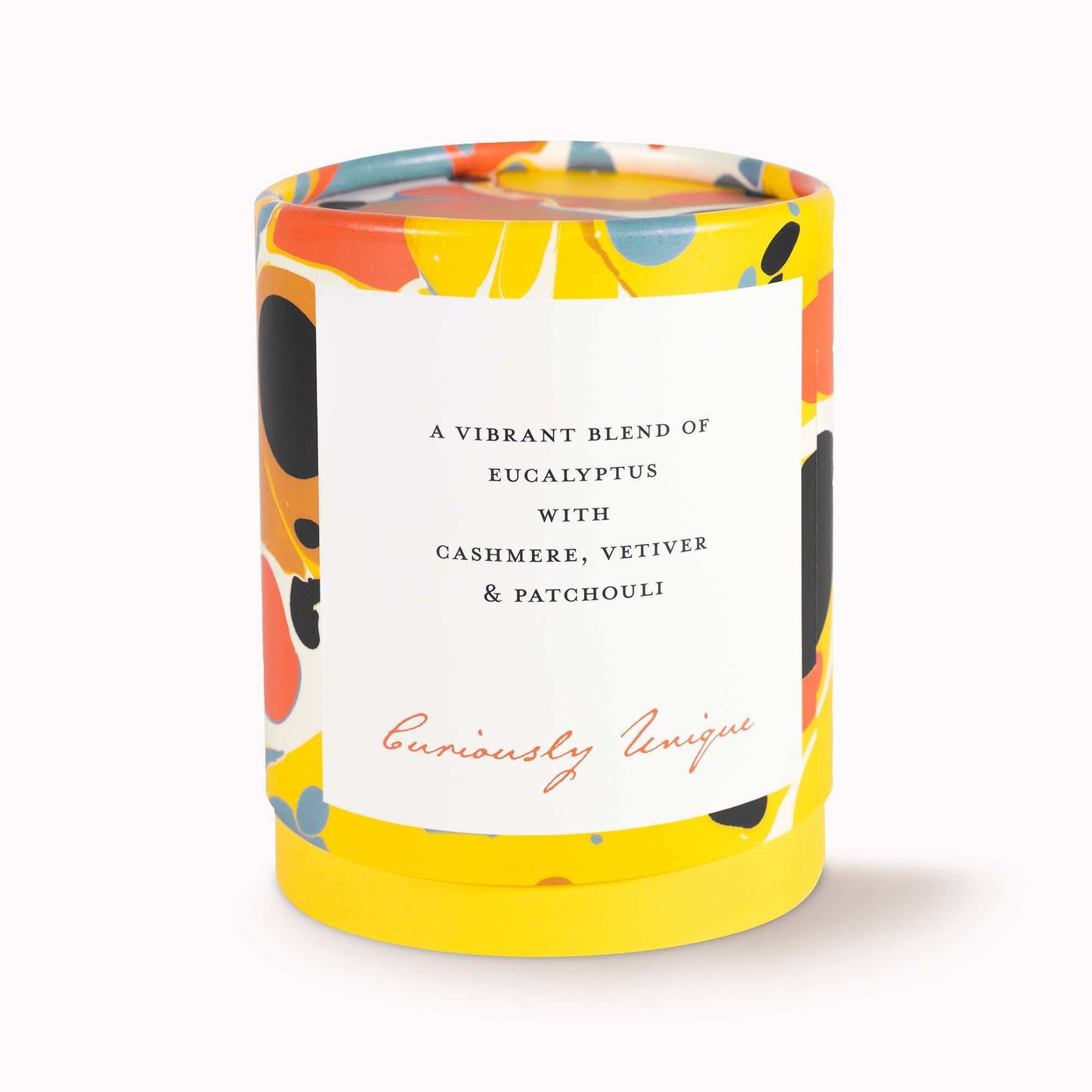 Abstracte Candle with eucalyptus, cashmere, vetiver, and patchouli in vibrant pattern design.
