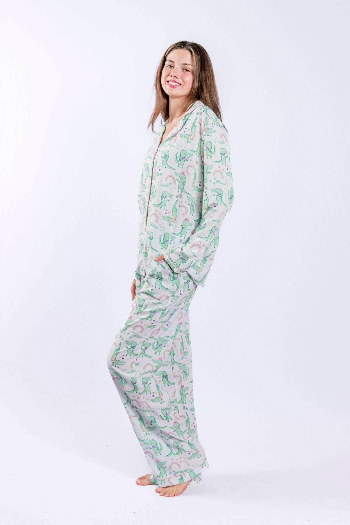 Alligator print pajama set with long sleeve button down shirt and pants.