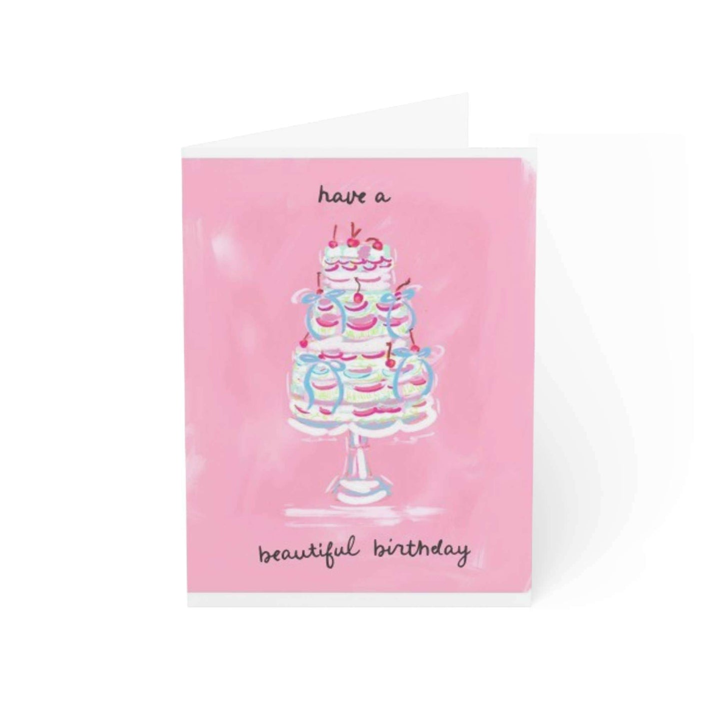 Beautiful birthday note card with pink cake illustration and blank interior.
