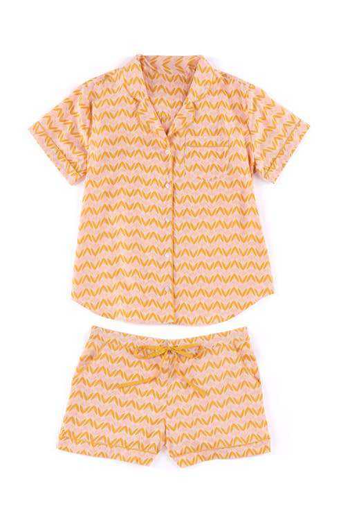 Blush Flora PJ Set in cotton with short sleeves and shorts, featuring a drawstring bag.