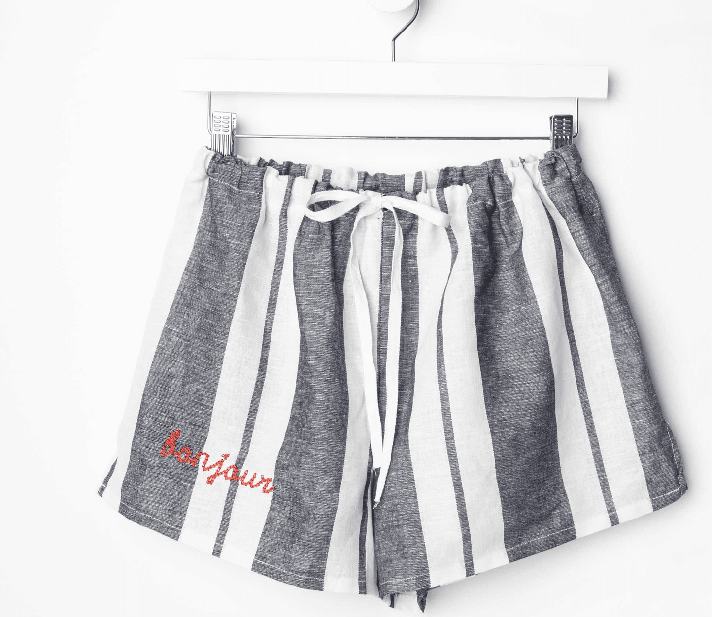 Linen PJ shorts with drawstring waist, perfect for summer lounging.
