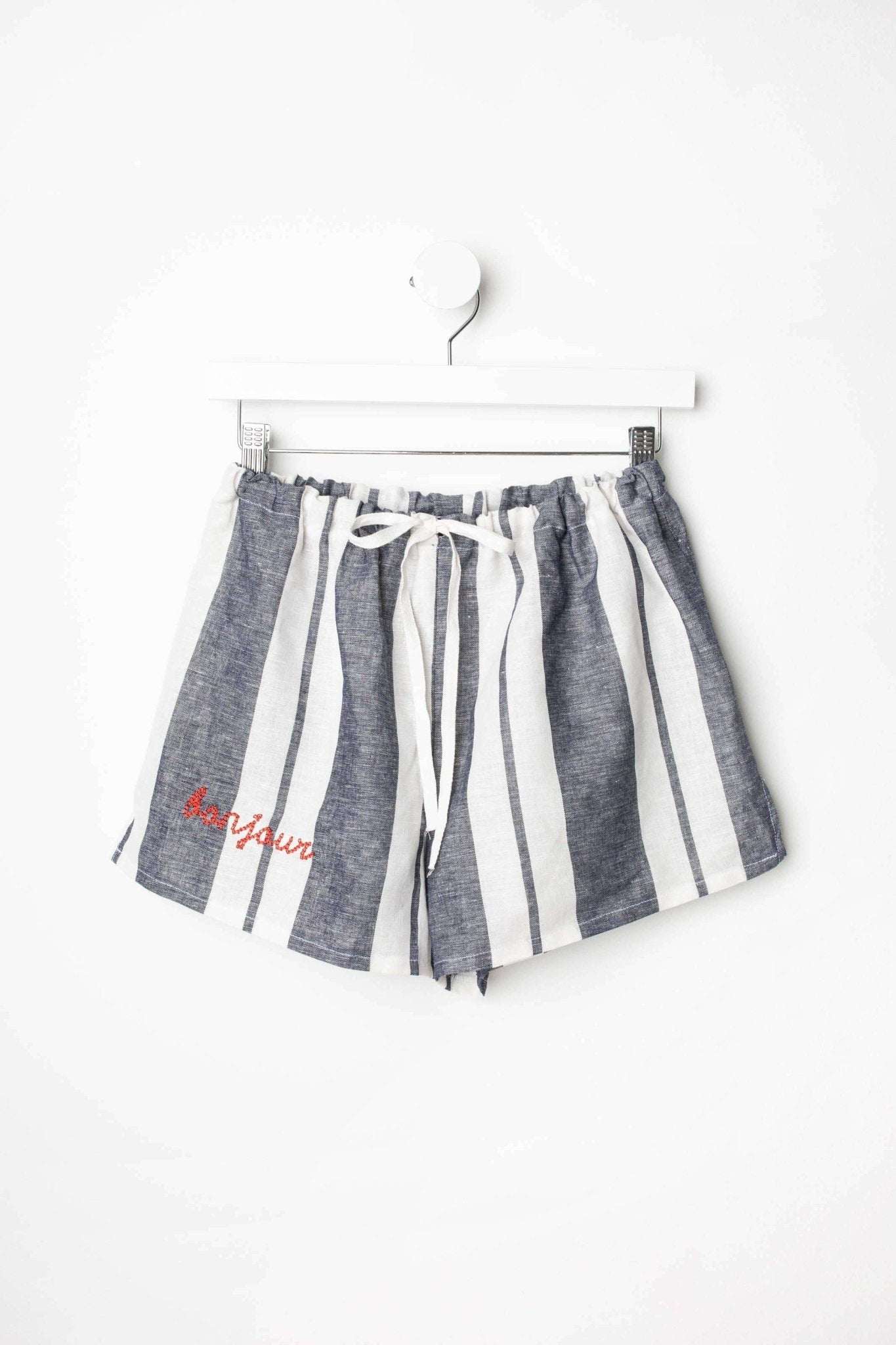 Striped linen PJ shorts with elastic and ribbon drawstring waist, perfect for lounging and summer outings.