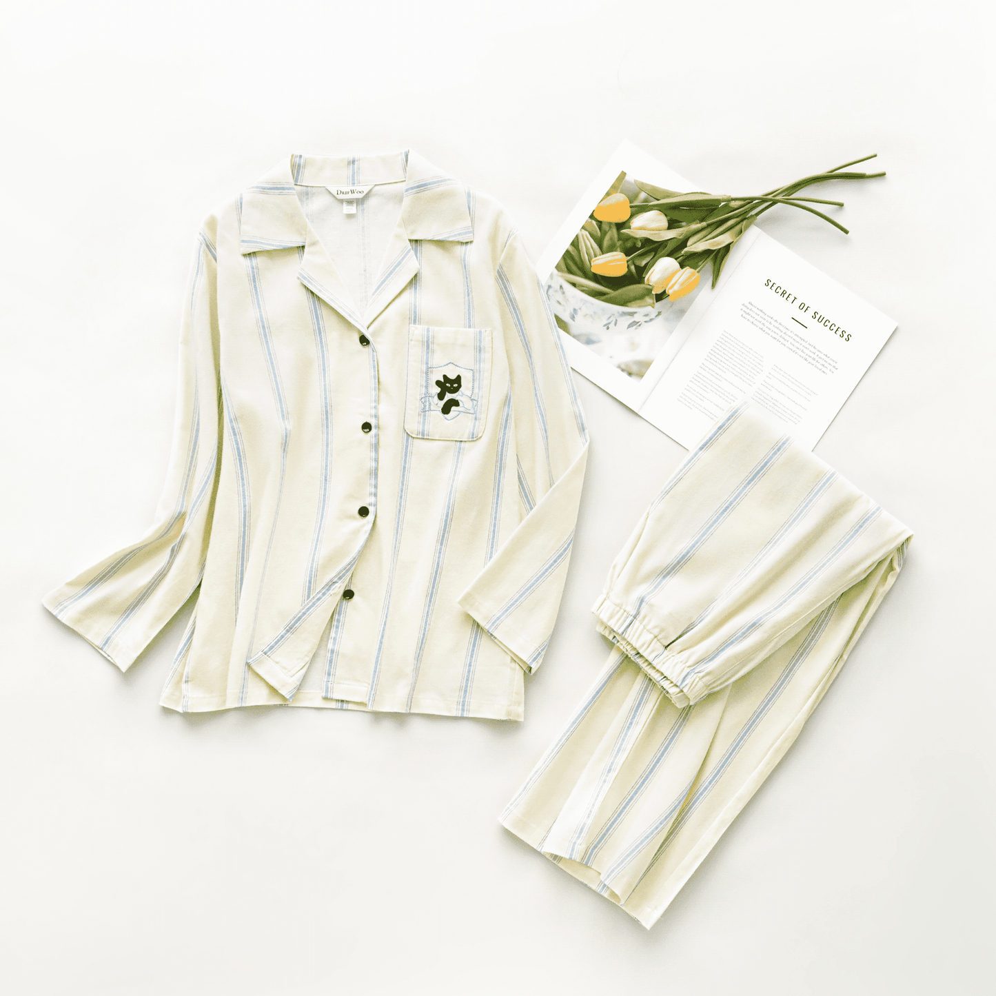 Cotton striped loungewear set with blue stripes, embroidered cat details, 100% cotton fabric.