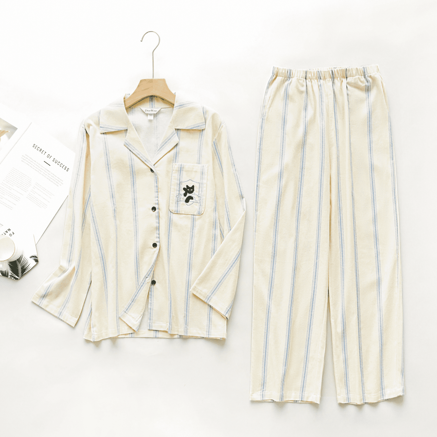 Cotton striped loungewear set with blue stripes and cat embroidery, cozy and 100% cotton, perfect for winter lounging.