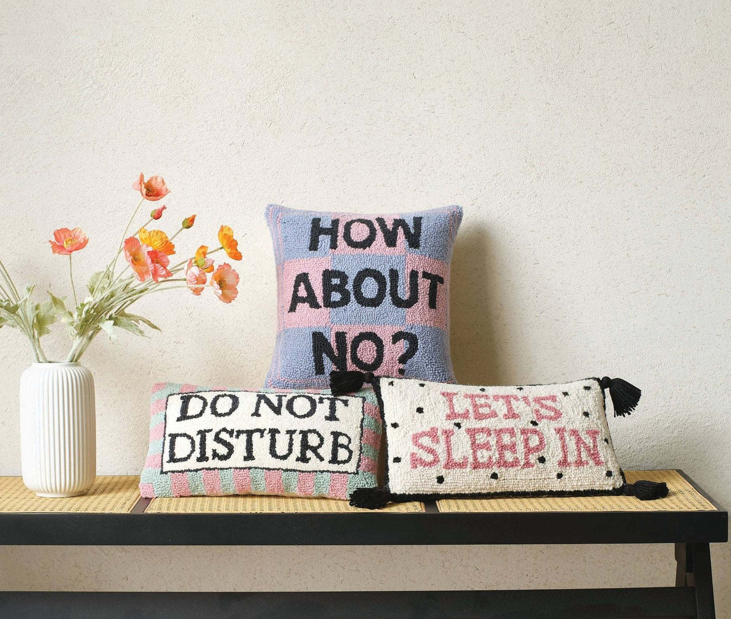 Do Not Disturb Hook Pillow with wool texture and polyester velvet backing on display.