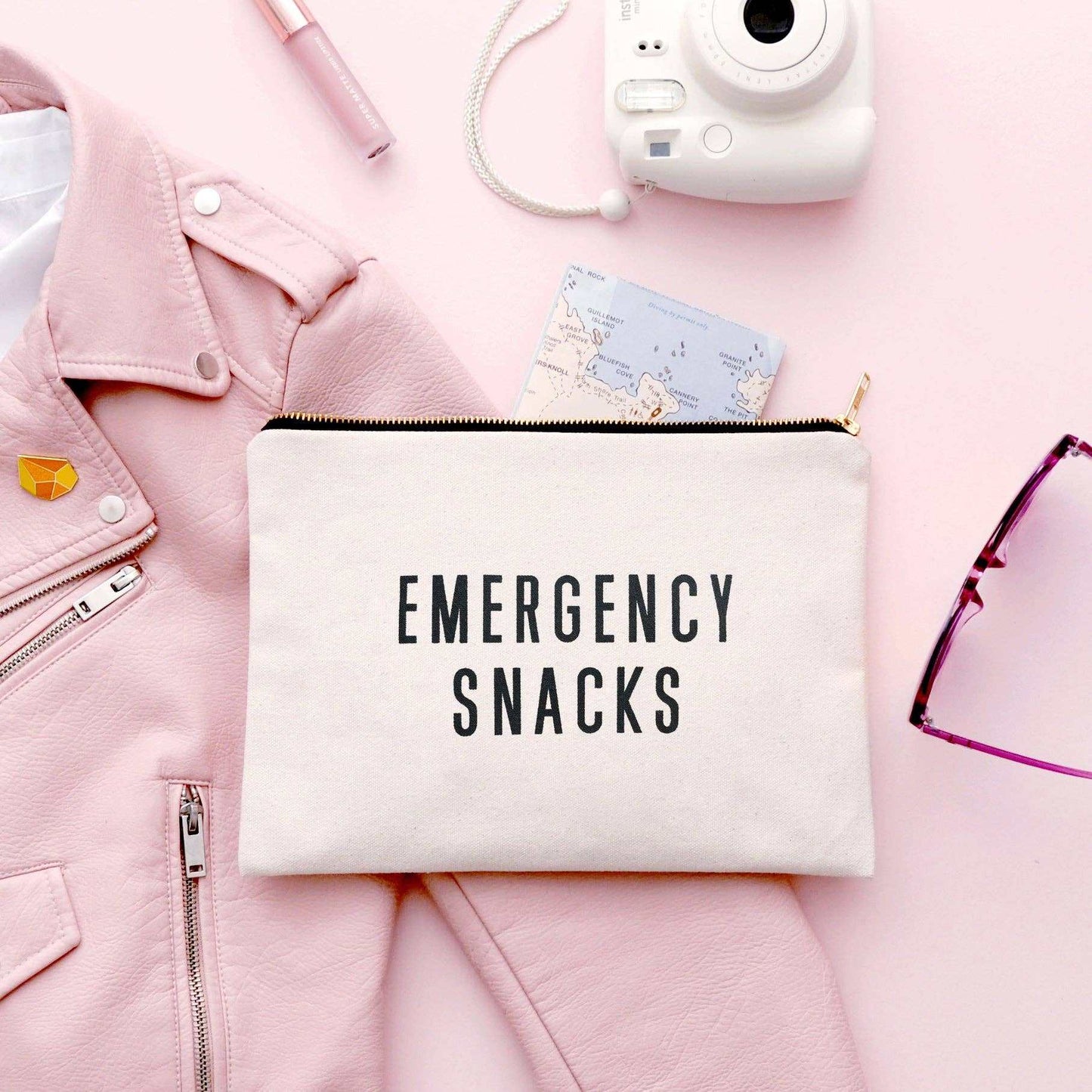 Large canvas pouch with "Emergency Snacks" text, heavy-duty gold zip, black cotton lining, made in the UK.