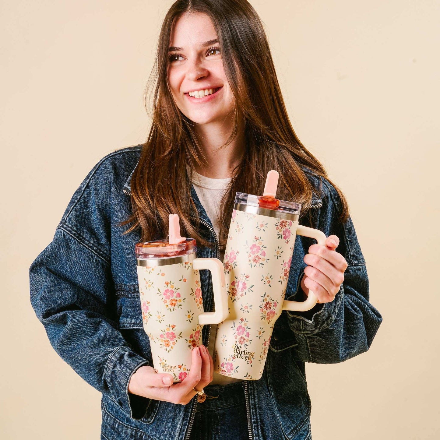 40 oz Endless Daydream Cream Lifestyle Flip Straw Tumbler with floral design and sturdy handle.