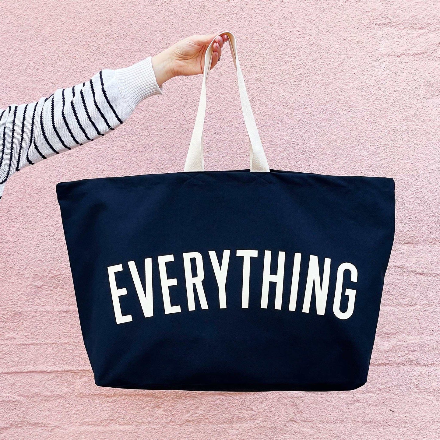 Midnight Blue REALLY Big Bag with "Everything" text, oversized canvas tote with off-white handles.
