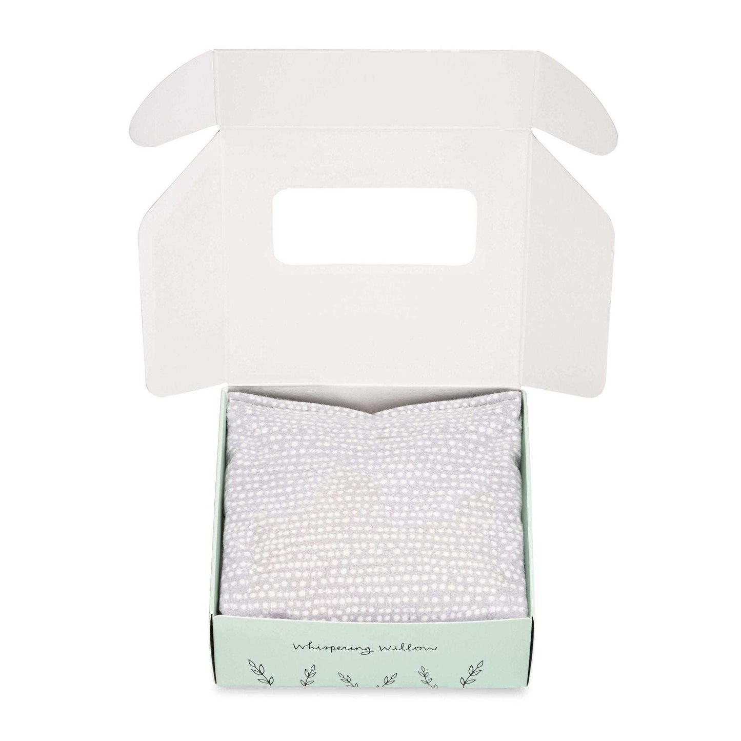 Lavender eye pillow in open box with soft cotton flannel visible, designed for relaxation and aromatherapy.