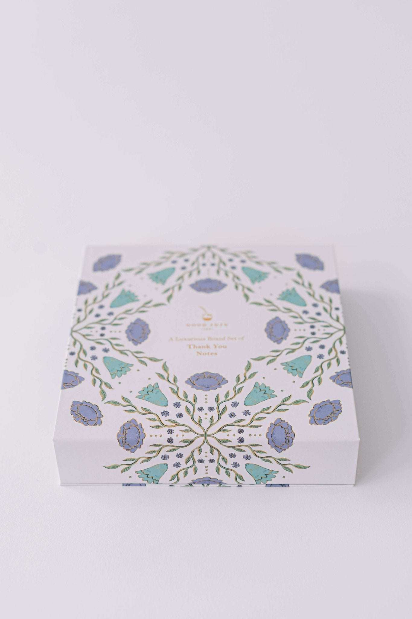 Folk Pattern Luxury Stationery Set in green and blue with gold foil detailing, featuring a keepsake box.