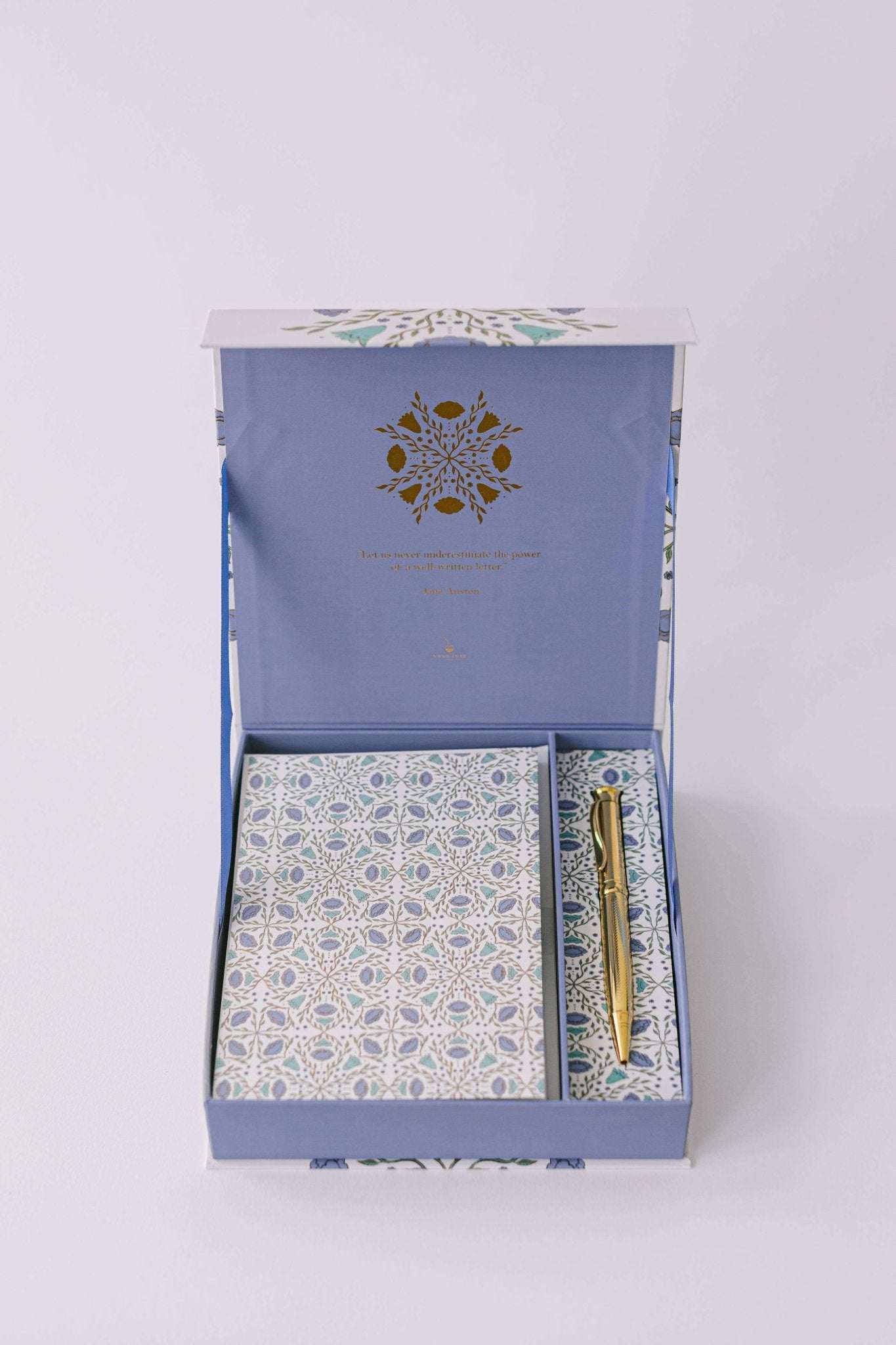 Folk Pattern Luxury Stationery Set in green and blue with gold-foiled box, writing sheets, envelopes, sealing stickers, and pen.
