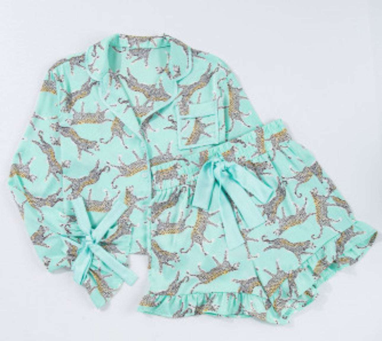 Green leopard satin ruffle pajama short set with bow detail.