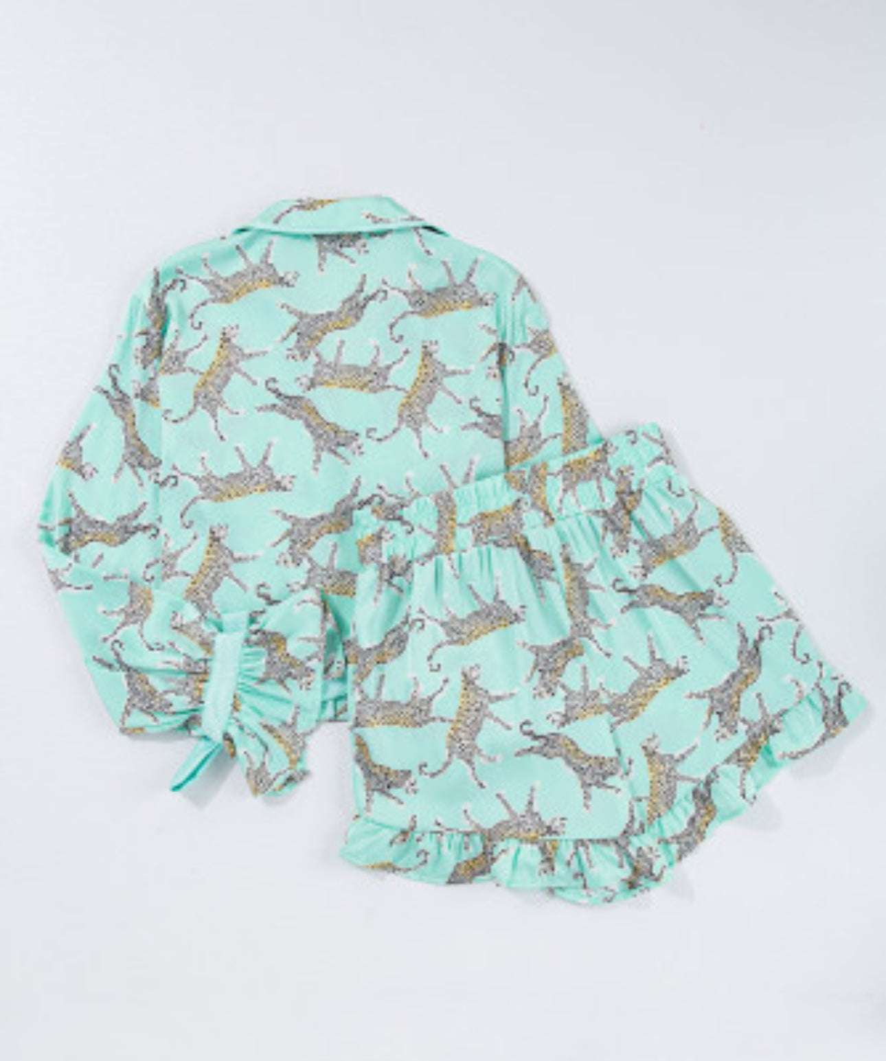 Green Leopard Satin Ruffle Pajama Short Set with boxy crop top and high-waisted ruffle shorts.