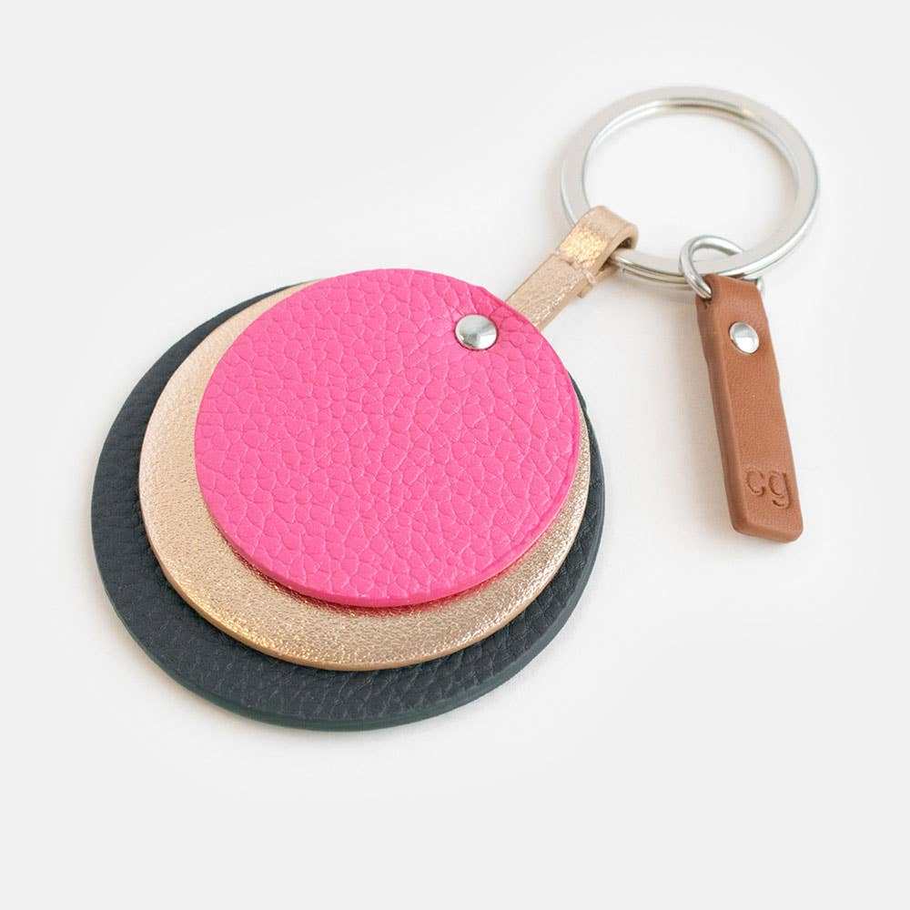 Green and pink layered spot keyring with leather look disc shape, suitable as a traditional keyring or bag charm.