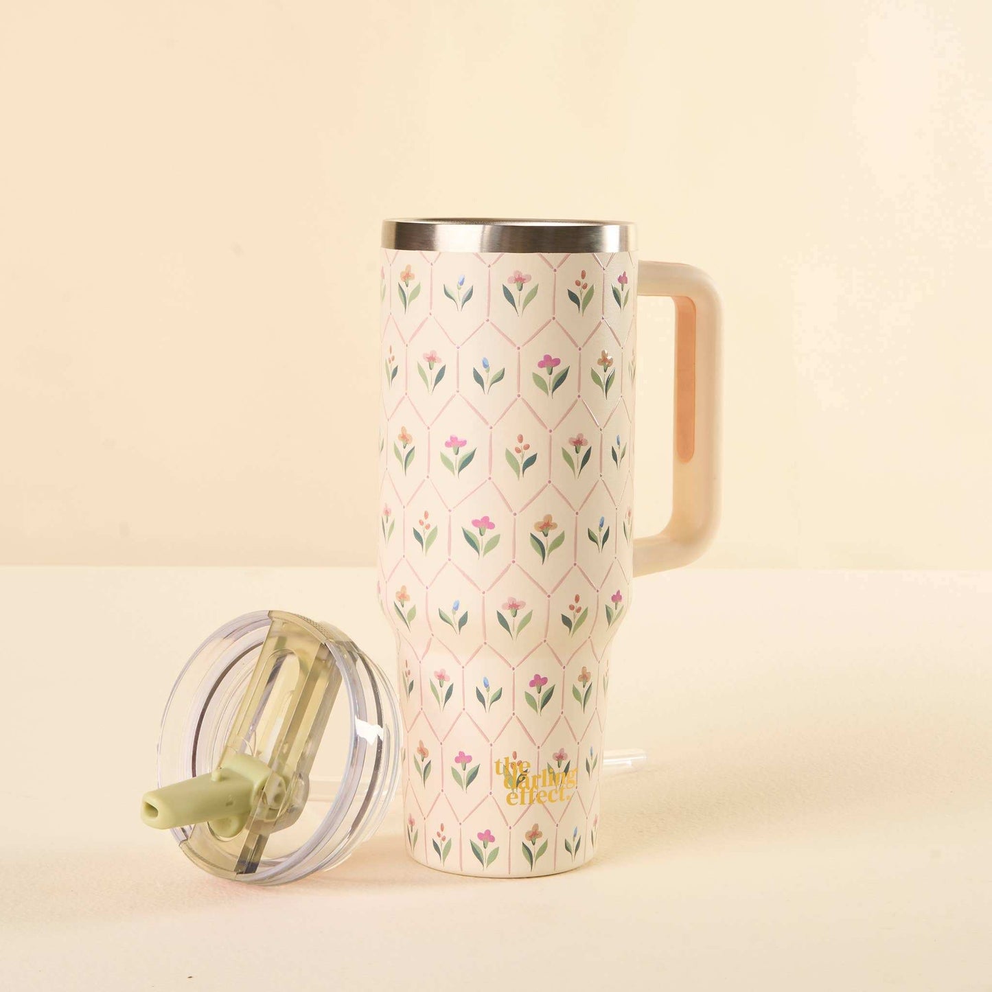40 oz Lifestyle Flip Straw Tumbler with floral design and detachable lid.