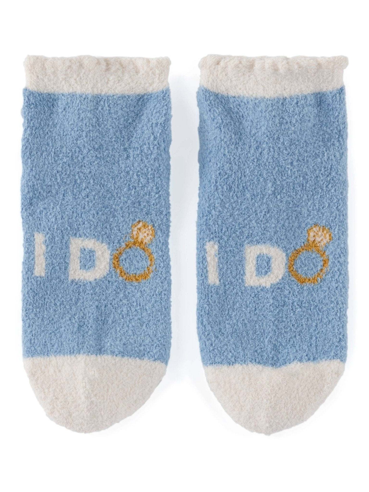 I DO Home Socks in blue with white toe and cuff, fits size 5-10, rubber grip bottom.