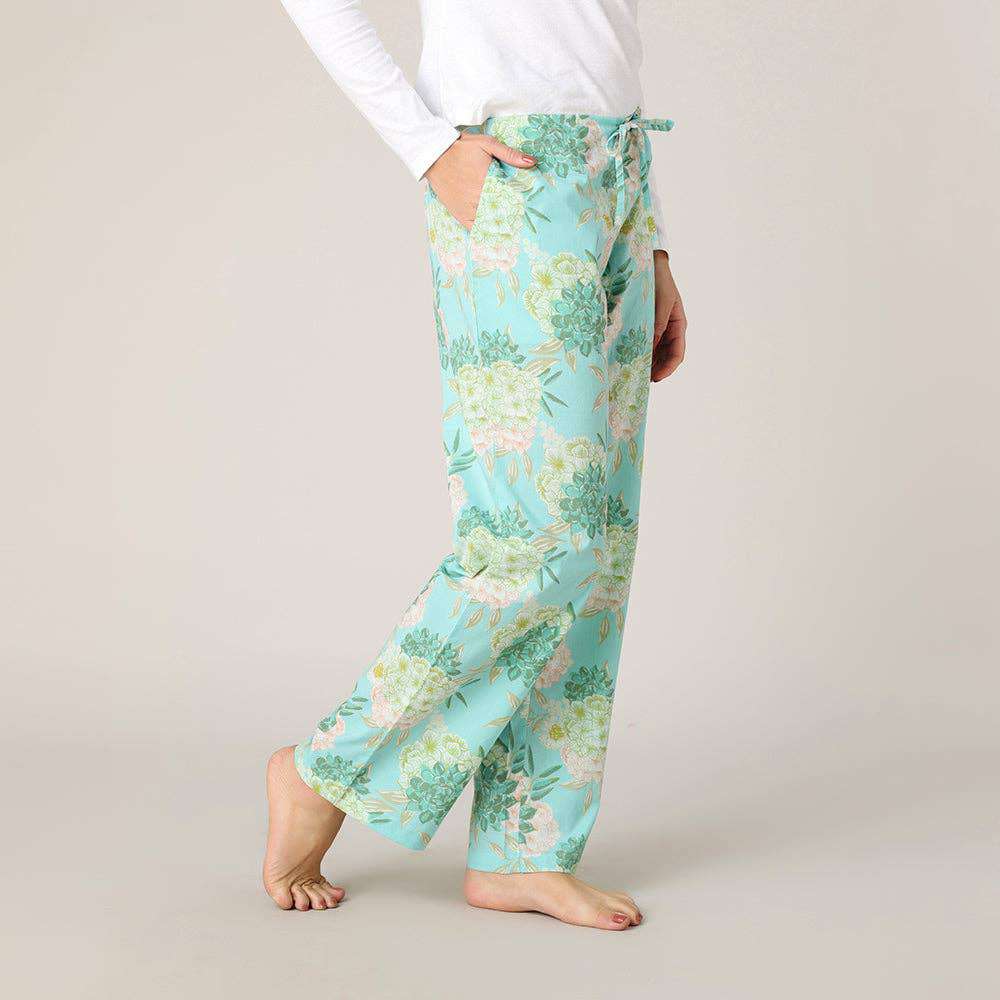 Jolene Pant in a bag, lightweight cotton fabric with floral print, drawstring, elastic waistband, and pockets.