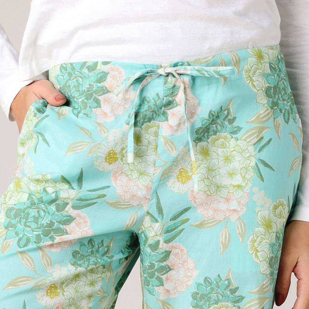 Jolene Pant in a bag, light blue floral pattern, cotton fabric, drawstring waist, pockets.