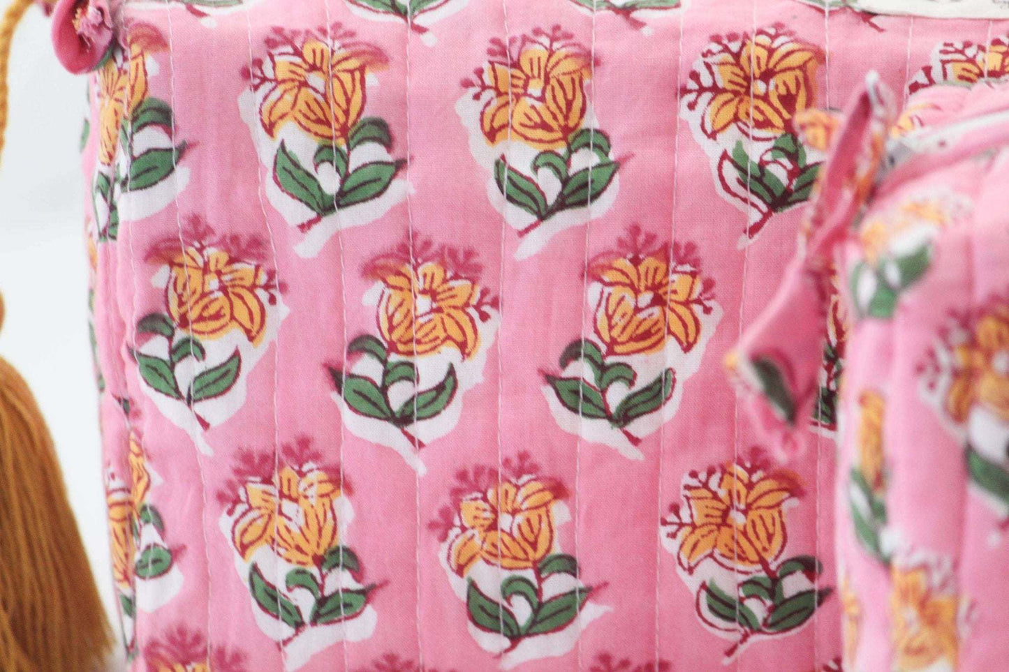 Large Bubblegum Mot Print Bag with floral design and quilted fabric.