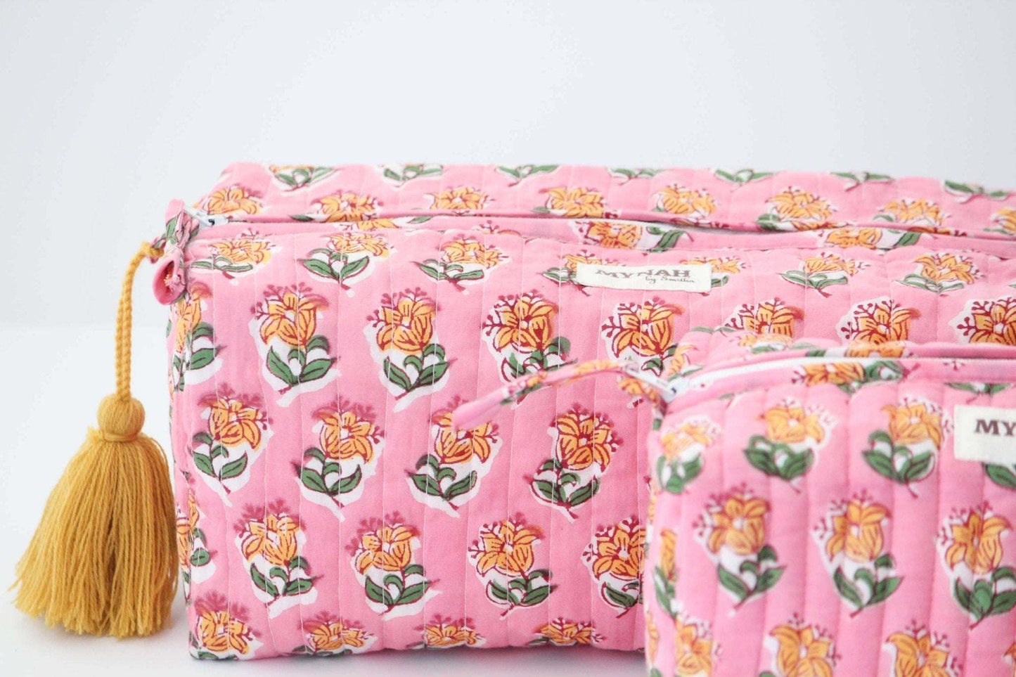 Large Bubblegum Mot Print Bag with hand block print and waterproof lining.