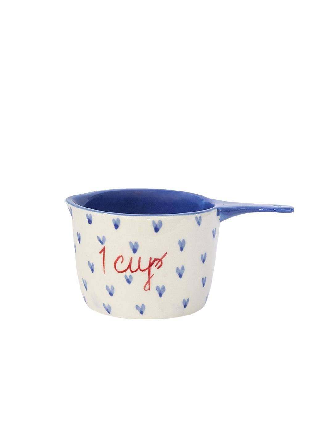 Little Hearts Measuring Ceramic Cup with handpainted design, 1-cup size.