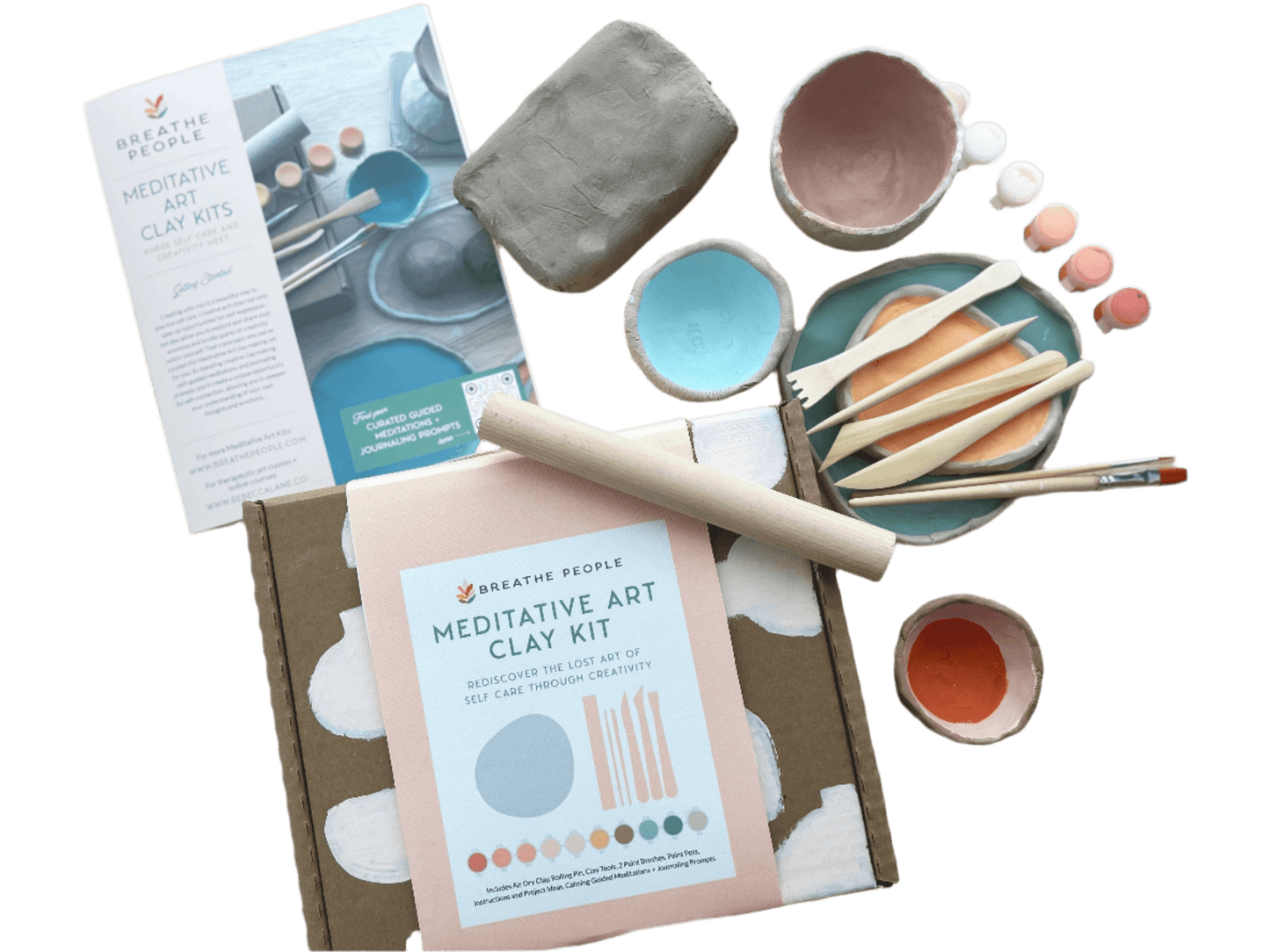 Meditative Art Clay Kit with tools, air dry clay, paints, and project instructions.