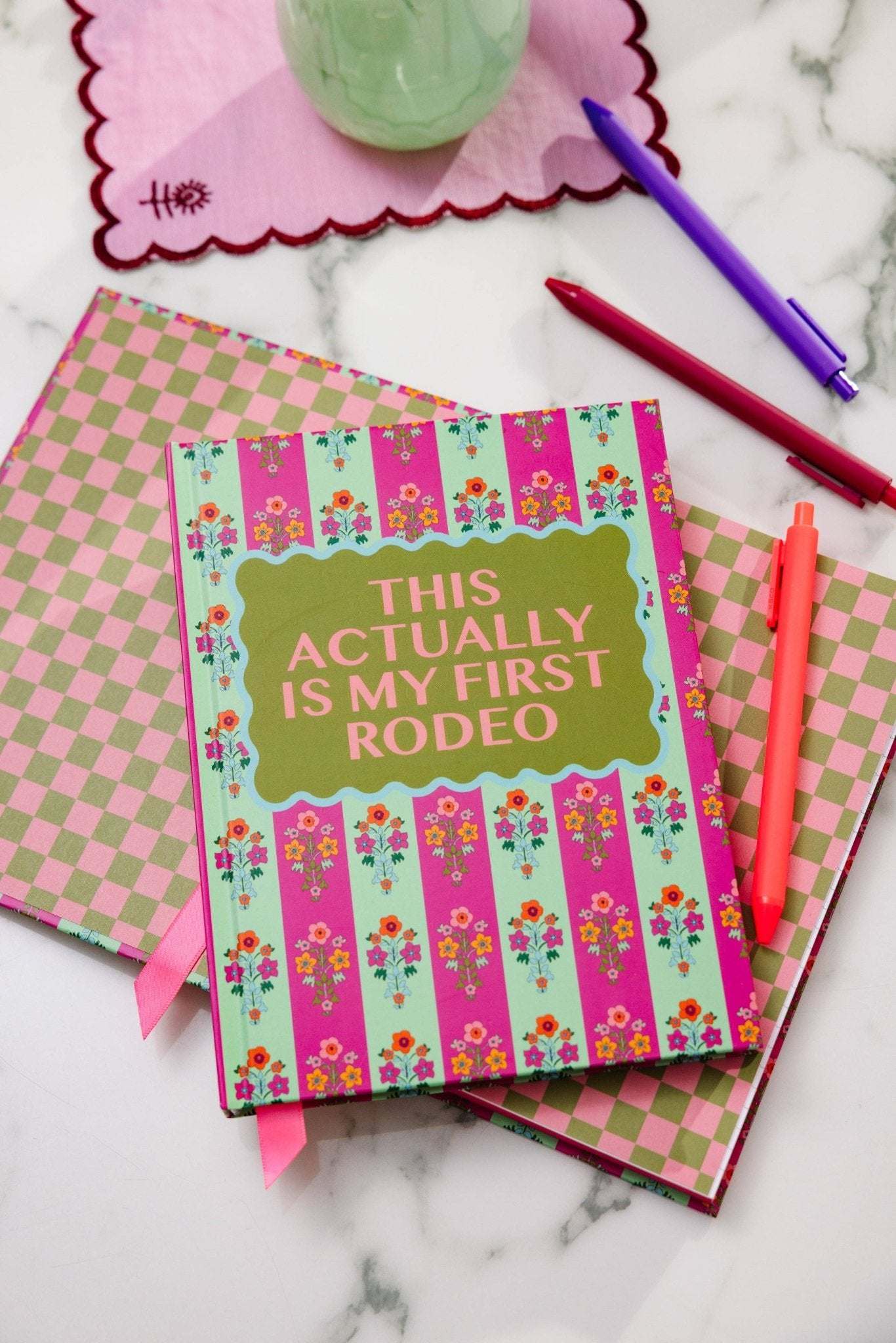 Notebook - Rodeo with vibrant stripe design featuring floral patterns, ideal for daily intentions and creative expression.