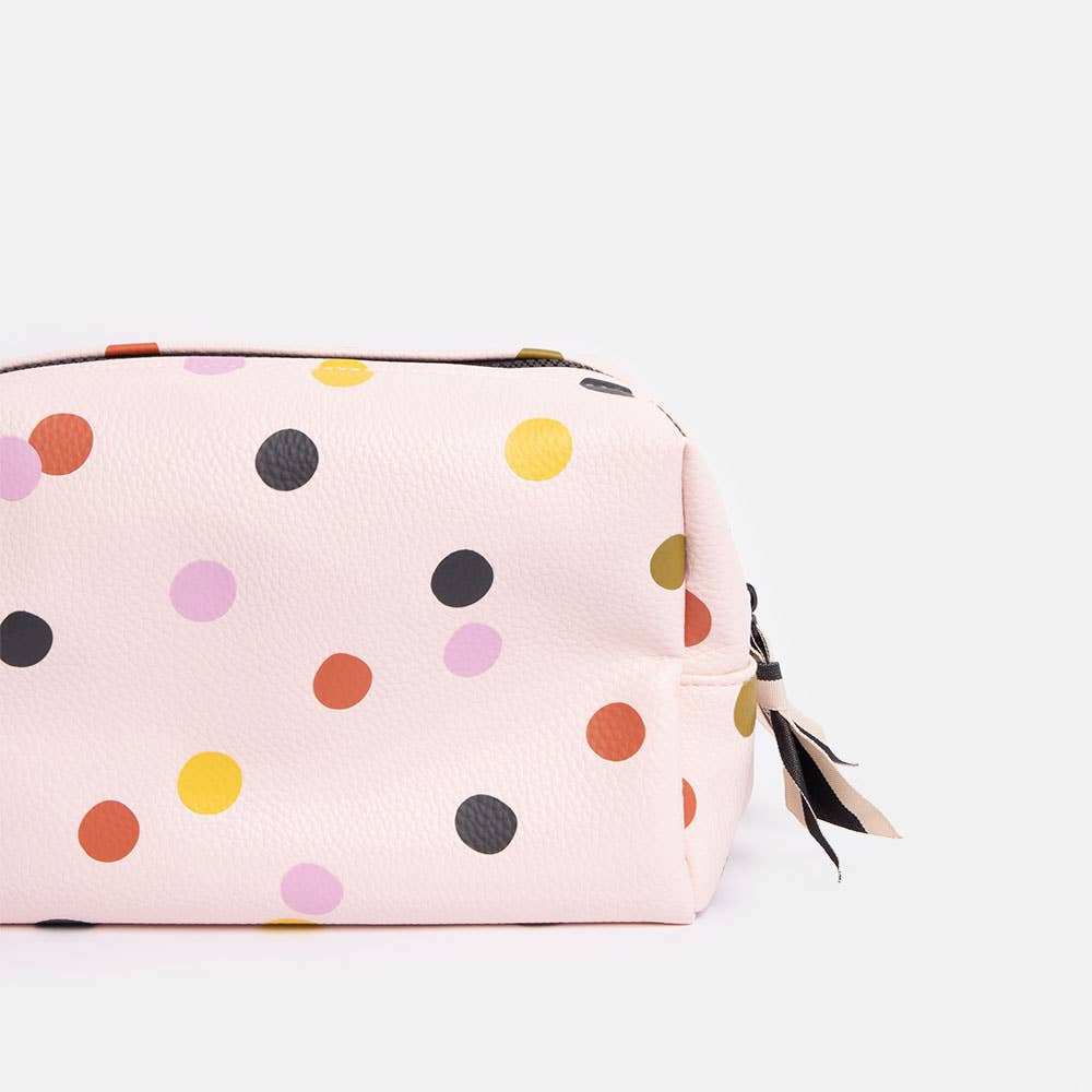 Pale pink dotty large travel washbag with handle and gold zip.