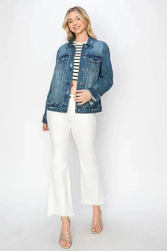RISEN Full Size distressed button-up jacket on woman with white pants.