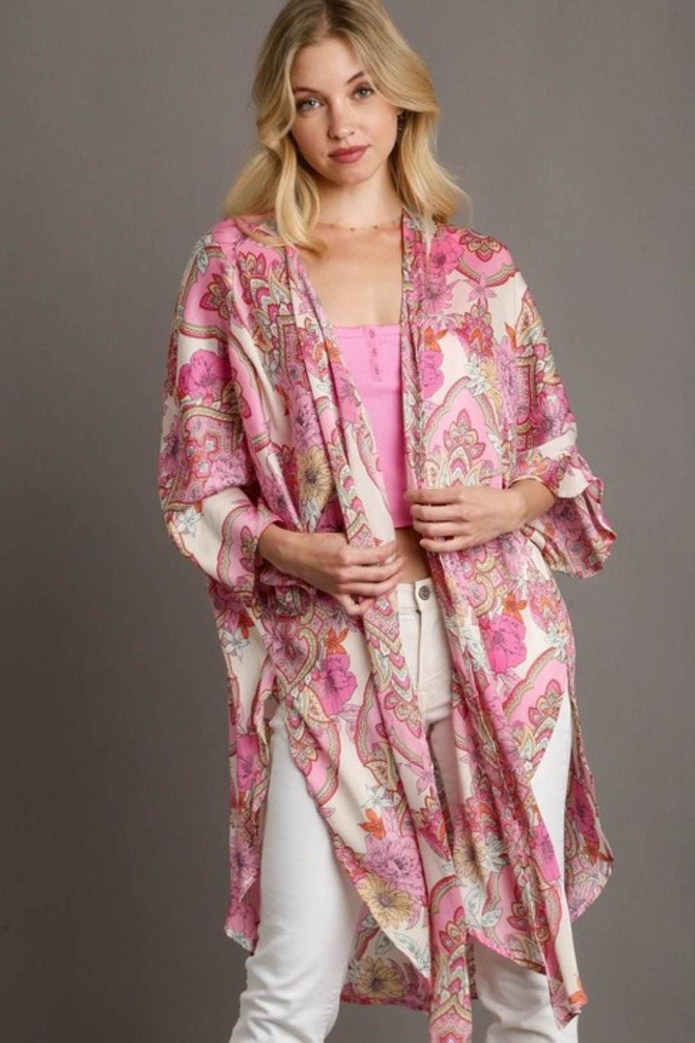Mixed print open front kimono with ruffle sleeves for a bohemian look.
