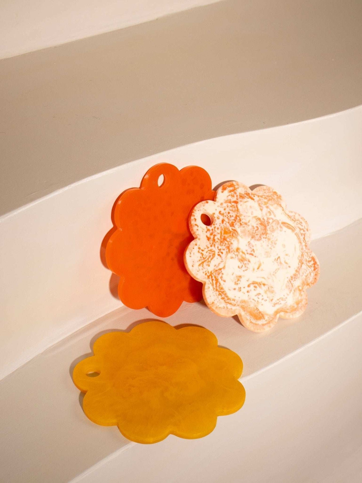 Ivory pink scallop resin cheese charcuterie board, 9 inches, handmade, ideal for serving and preparing meals.