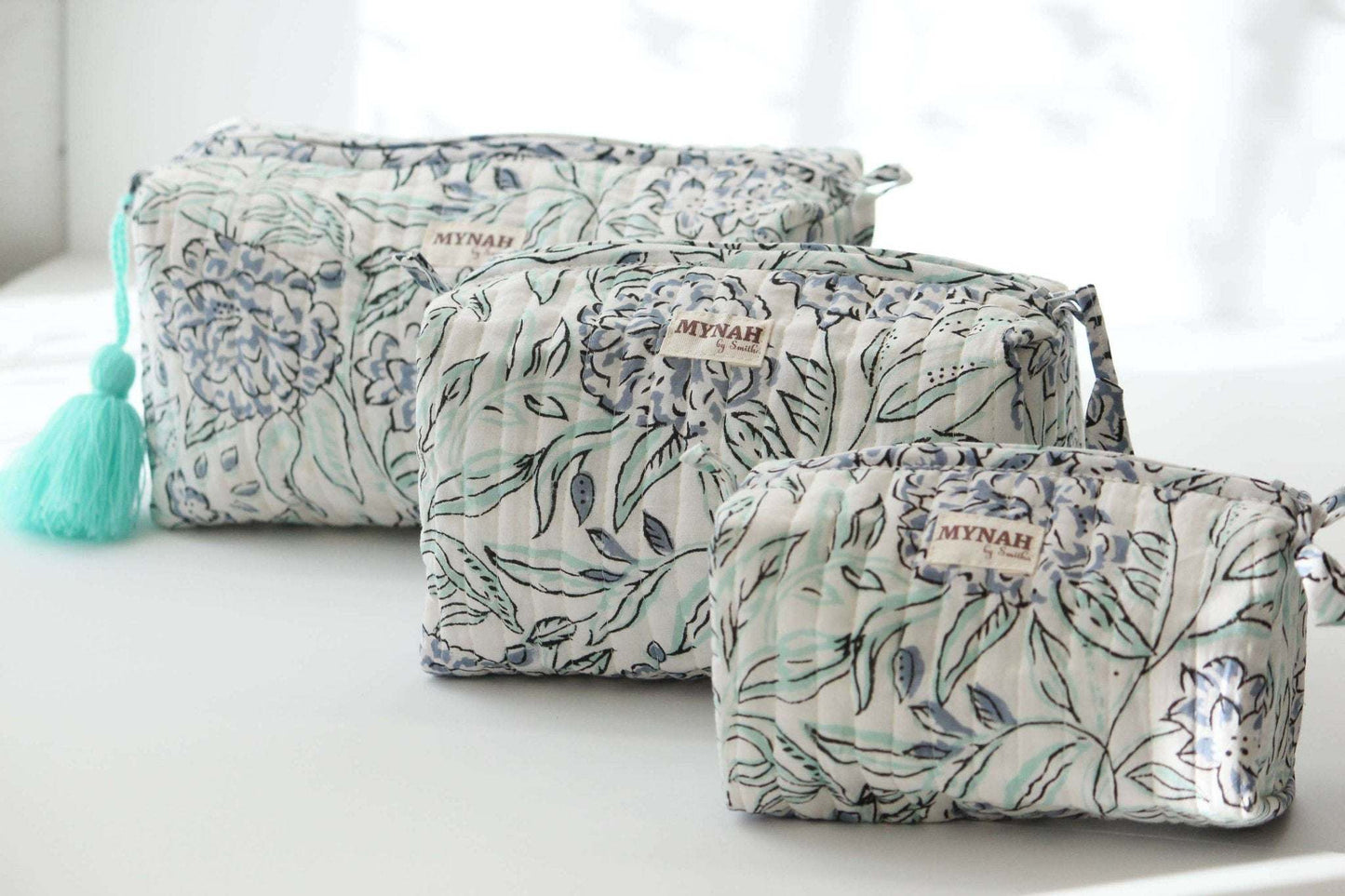 Set of 3 handmade hydrangea motif quilted bags with waterproof lining.