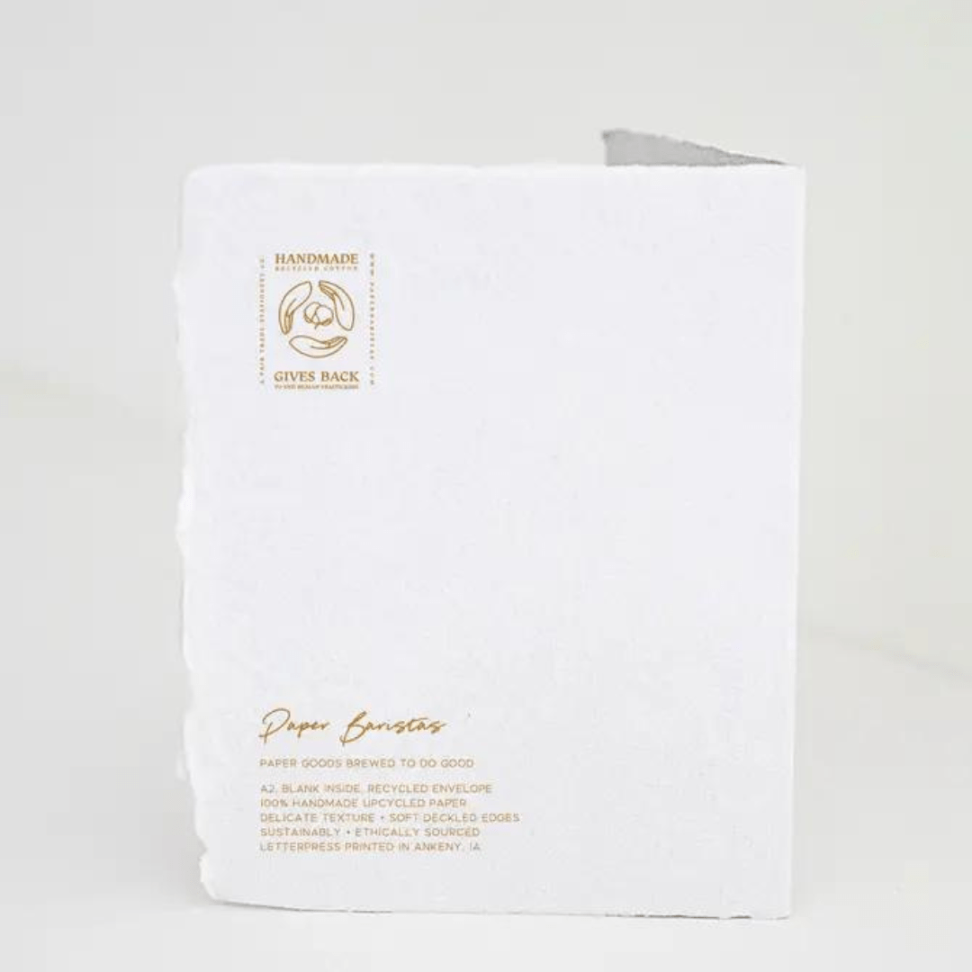 Handmade deckled edge graduation card with "Sky is the limit" message, featuring gold letterpress on white paper.