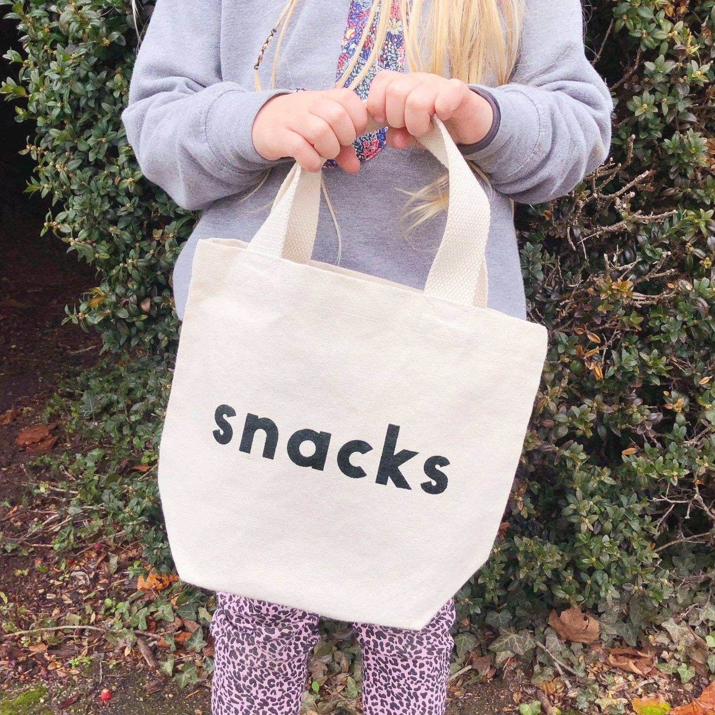 Little canvas bag for snacks, natural material, black screen print, suitable for kids.