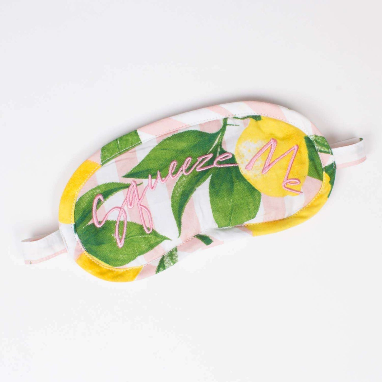 Squeeze The Day Eyemask with lemon and leaf print design on cotton fabric.