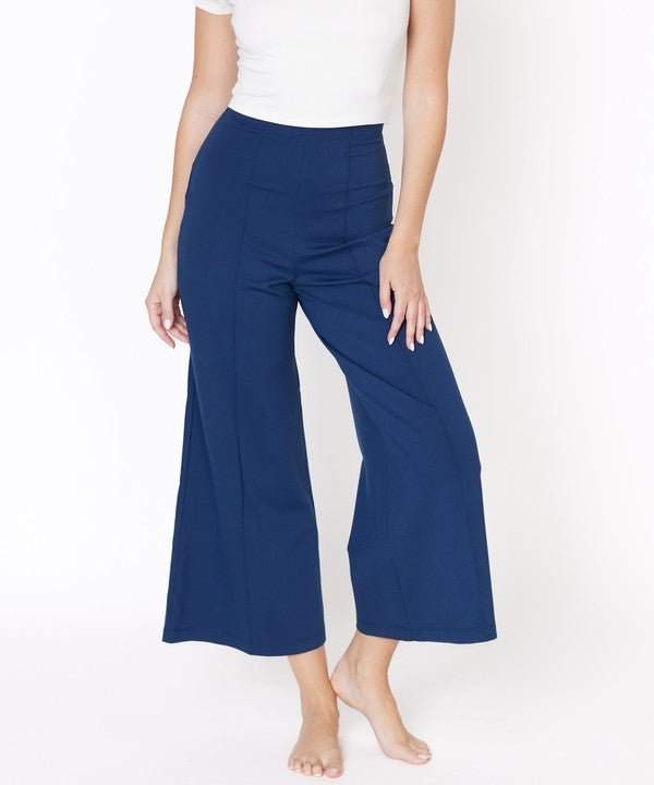 Studio Ko wide-leg ankle length pants in blue, high-waisted, made from bamboo blend.