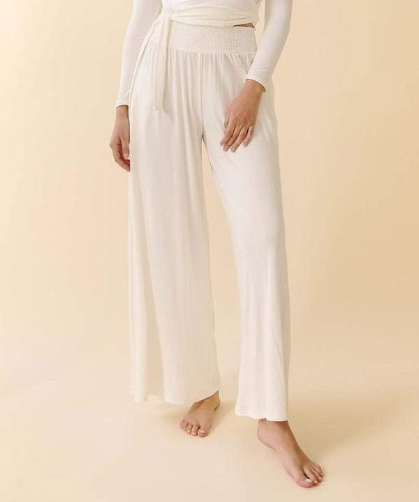 Studio Ko smocked palazzo pant, wide open design, elastic smock waist, pockets, organic bamboo fabric.
