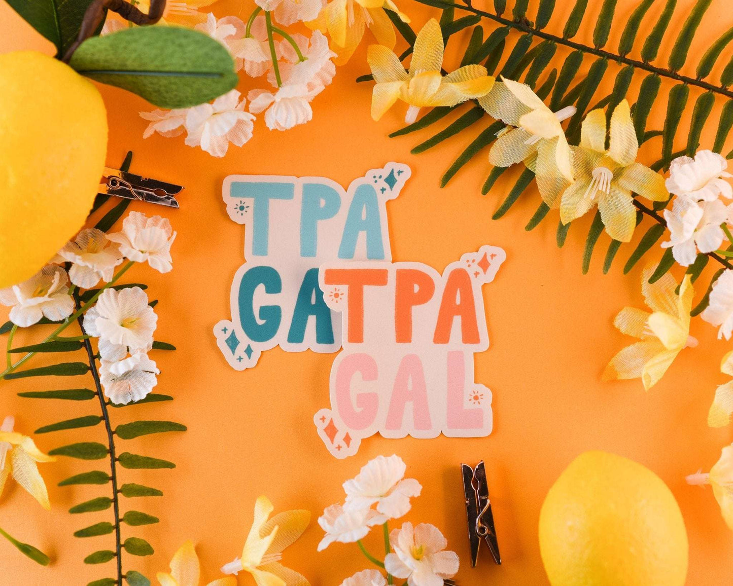 Tampa Gal sticker on orange background with flowers and lemons.