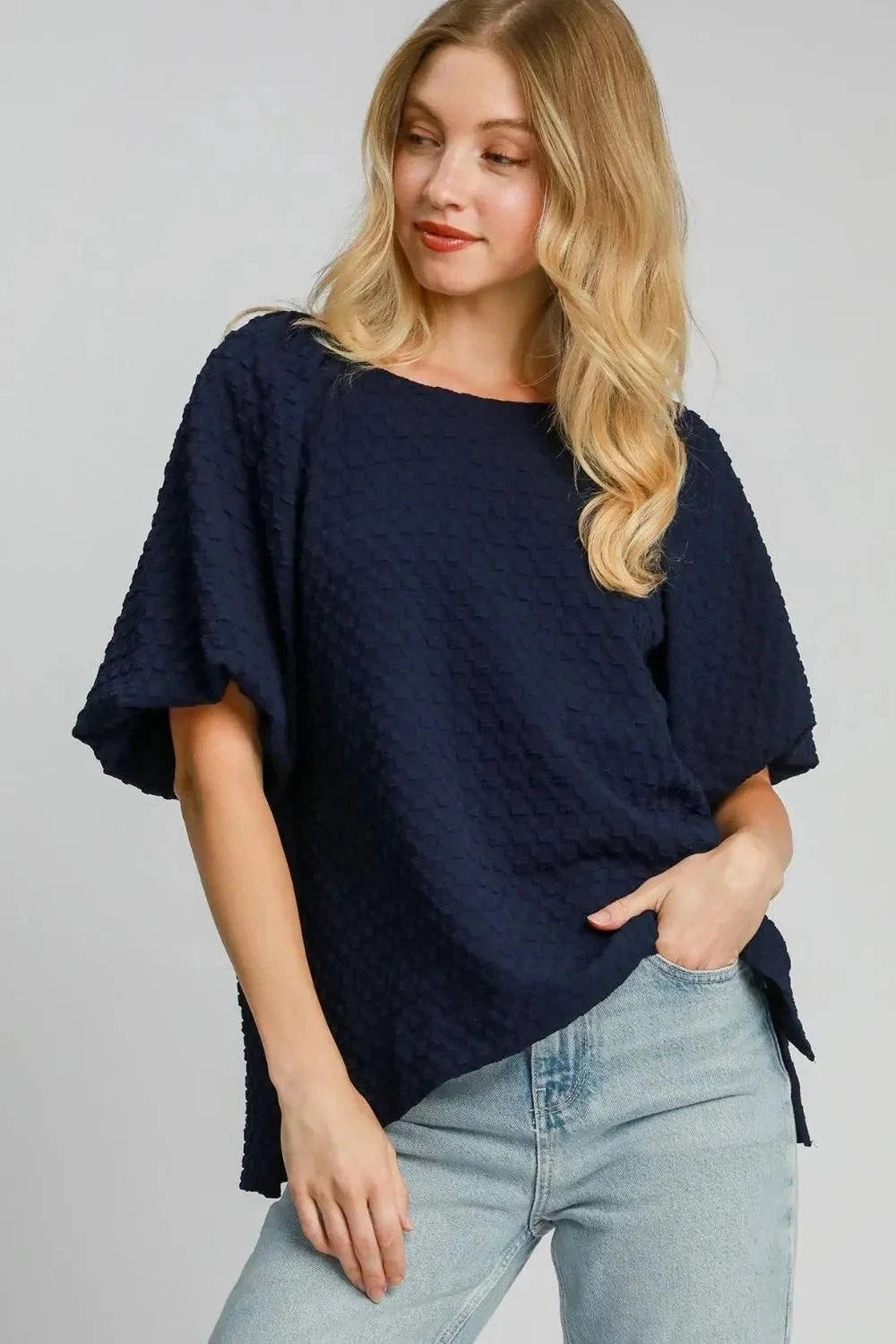 Umgee Boxy Cut Jacquard Round Neck Top with Side Slit in navy blue.