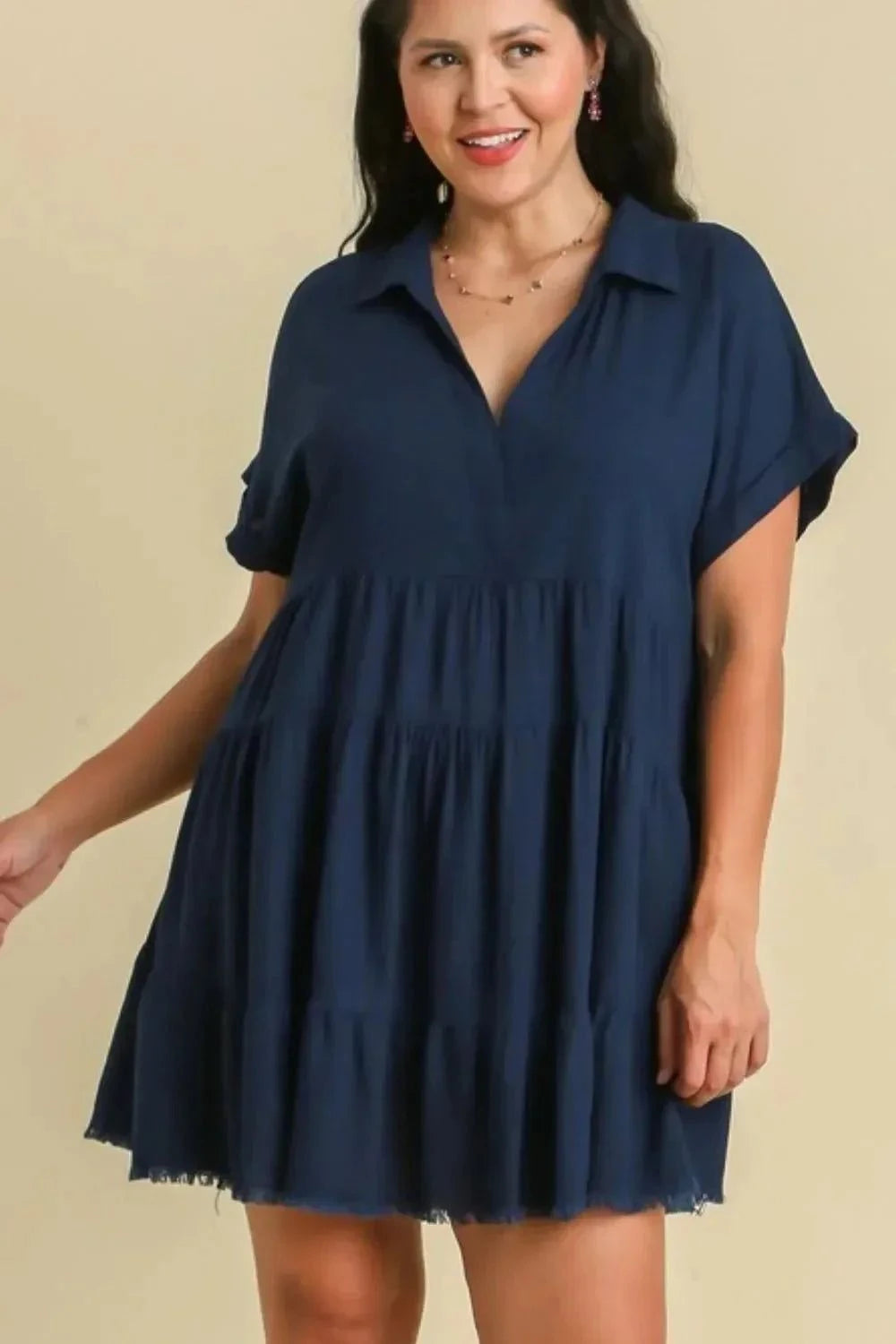 Umgee Raw Hem Folded Sleeve Tiered Dress in navy, featuring a casual flowy design with raw hem and tiered layers.