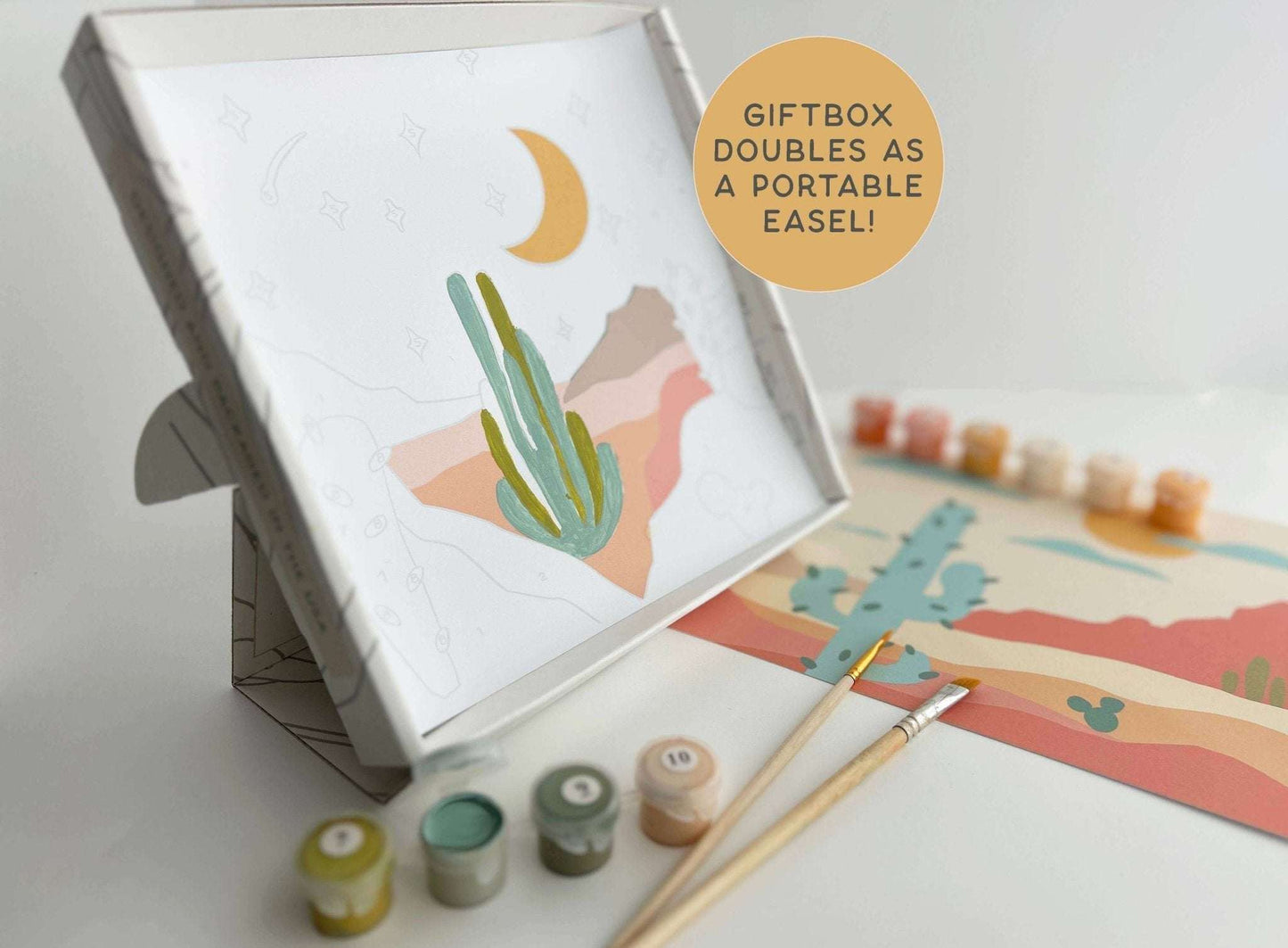 Paint by Number Kit with canvas, brushes, acrylic paints, and a gift box that doubles as a portable easel.