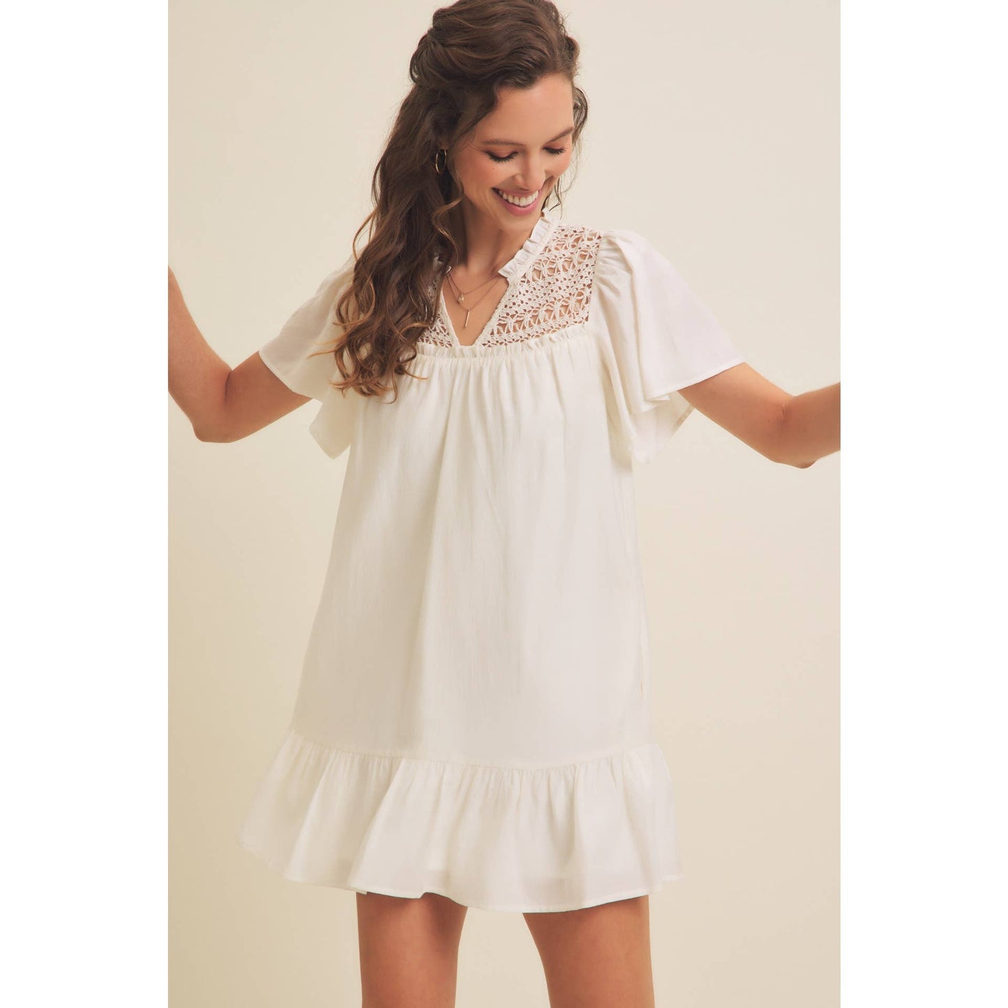 CROCHET MINI DRESS WITH FLARE SLEEVES AND POCKETS