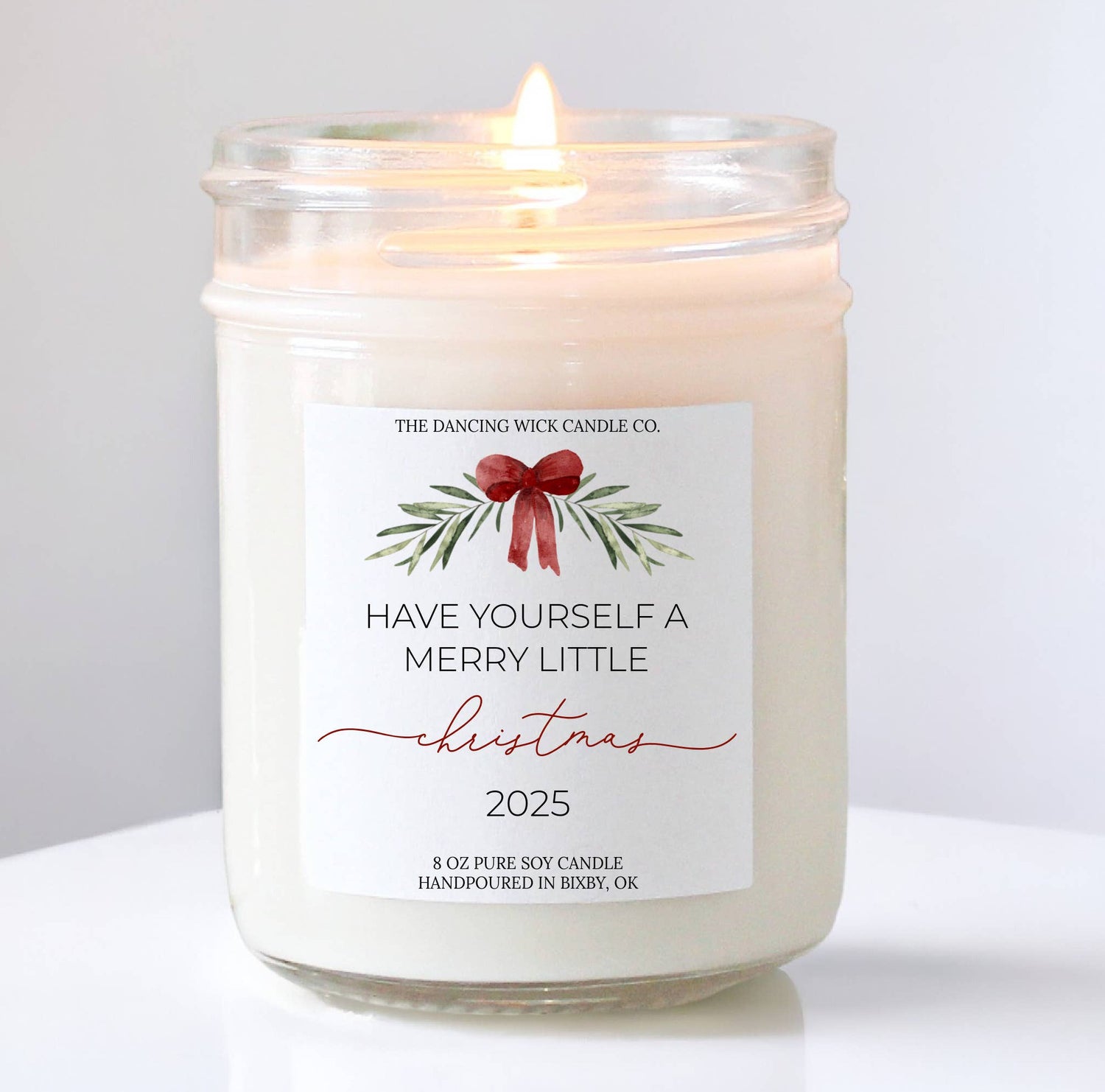 Merry Little Christmas candle featuring festive design and warm glow, perfect for holiday décor and gifting.