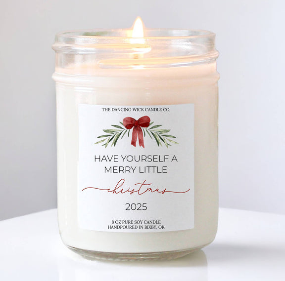 Merry Little Christmas candle featuring festive design and warm glow, perfect for holiday décor and gifting.