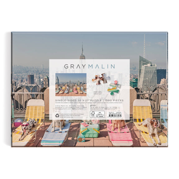 Gray Malin The Dogs of New York City 1000 Piece Puzzle box featuring dogs on a rooftop with city skyline.