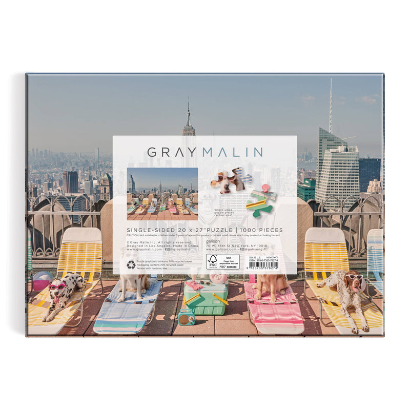 Gray Malin The Dogs of New York City 1000 Piece Puzzle box featuring dogs on a rooftop with city skyline.