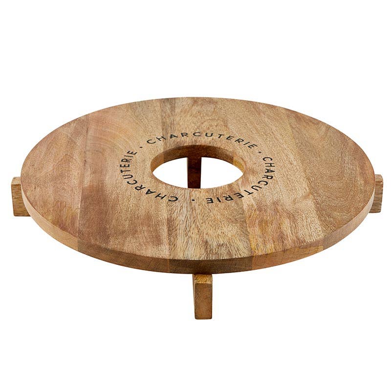 Santa Barbara Design Studio charcuterie board with wine holder made of mango wood, featuring printed phrase around center opening.