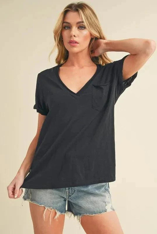 Aemi + Co Side Slit V-Neck T-Shirt with Short Rolled Sleeves in Black.