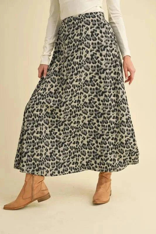 Aemi+Co Leopard Midi Skirt on model, featuring trendy animal print and flattering silhouette.